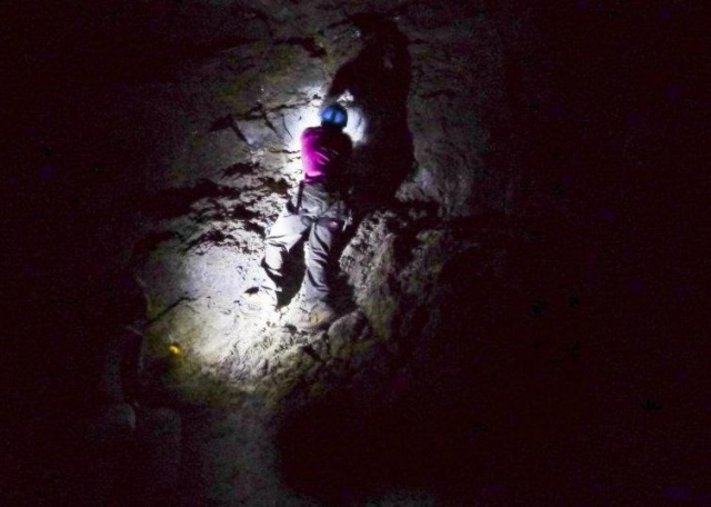  investigating the interior of the cave 